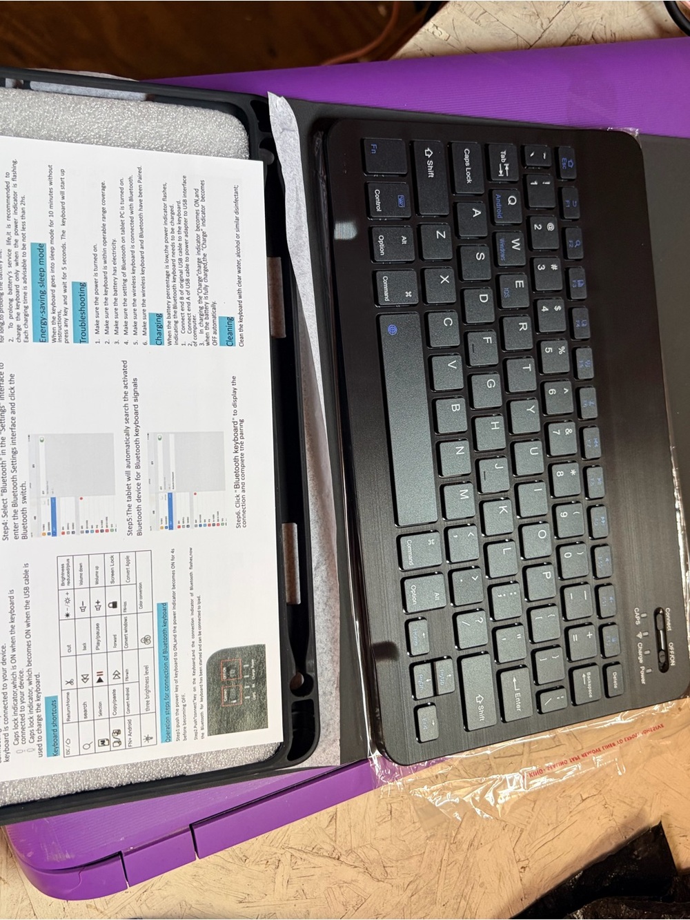 Logitech Black Bluetooth Keyboard Case with Purple Backing